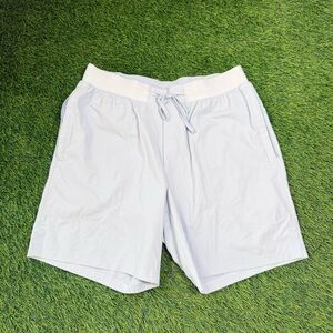 Lululemon Men’s License to train 7 in training shorts size small light blue